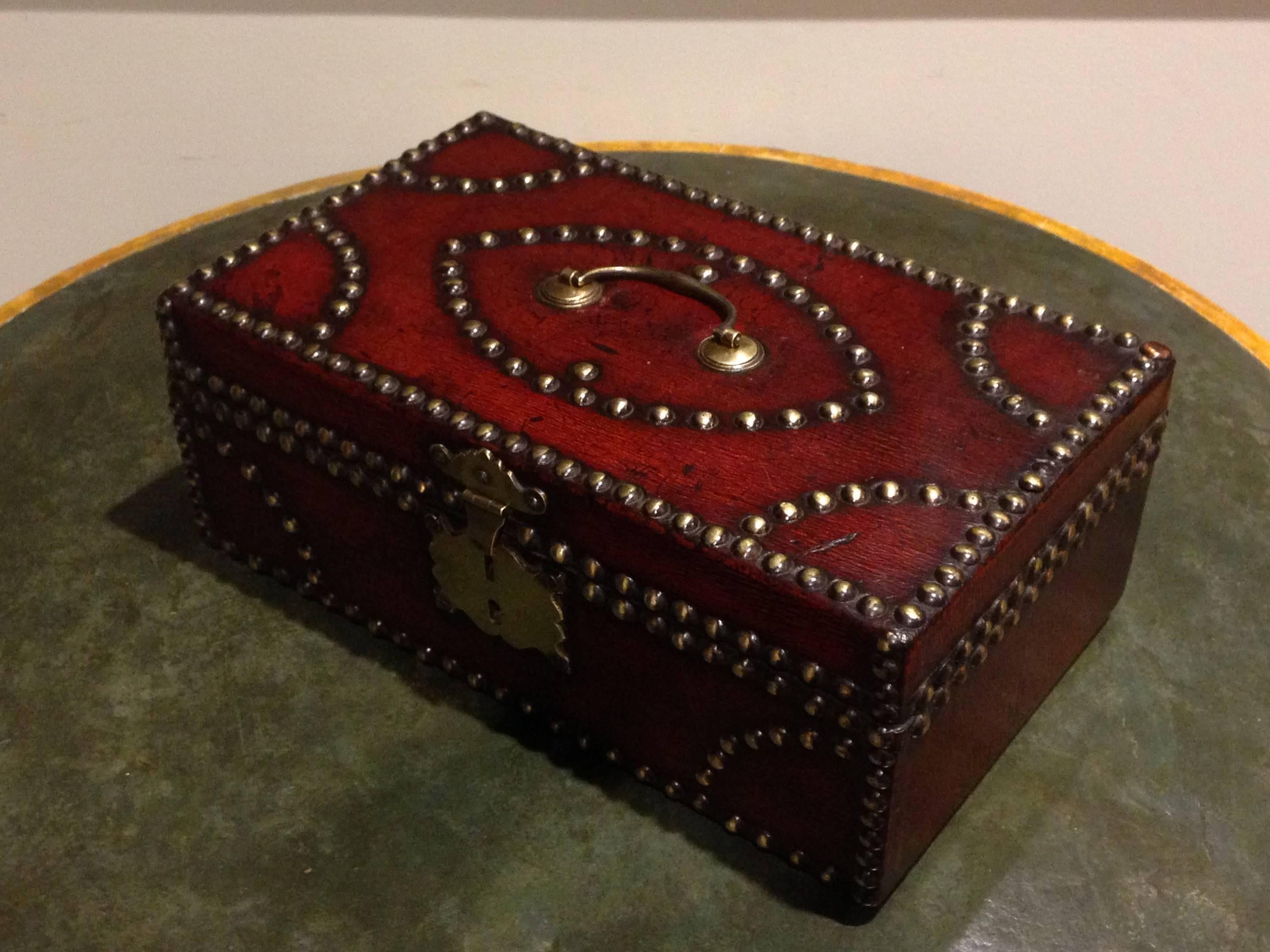 Late 18th early 19th century red Moroccan leather brass studded dispatch box. Retaining the original felt interior.