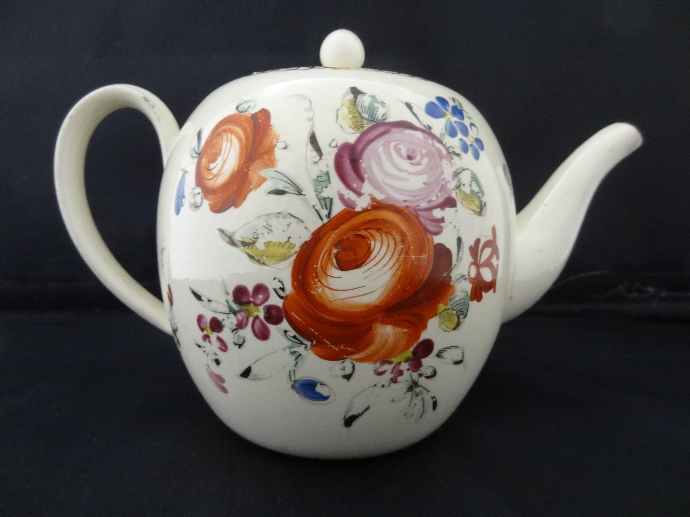 A beautiful example of a creamware teapot from Leeds.