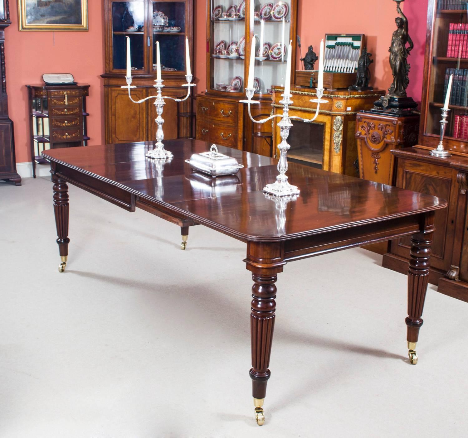 A very rare opportunity to own an antique English Regency dining room table, circa 1820 in date, which can seat eight people in comfort. 

The table is made of beautiful solid flame mahogany, has a winding mechanism and two leaves that can be