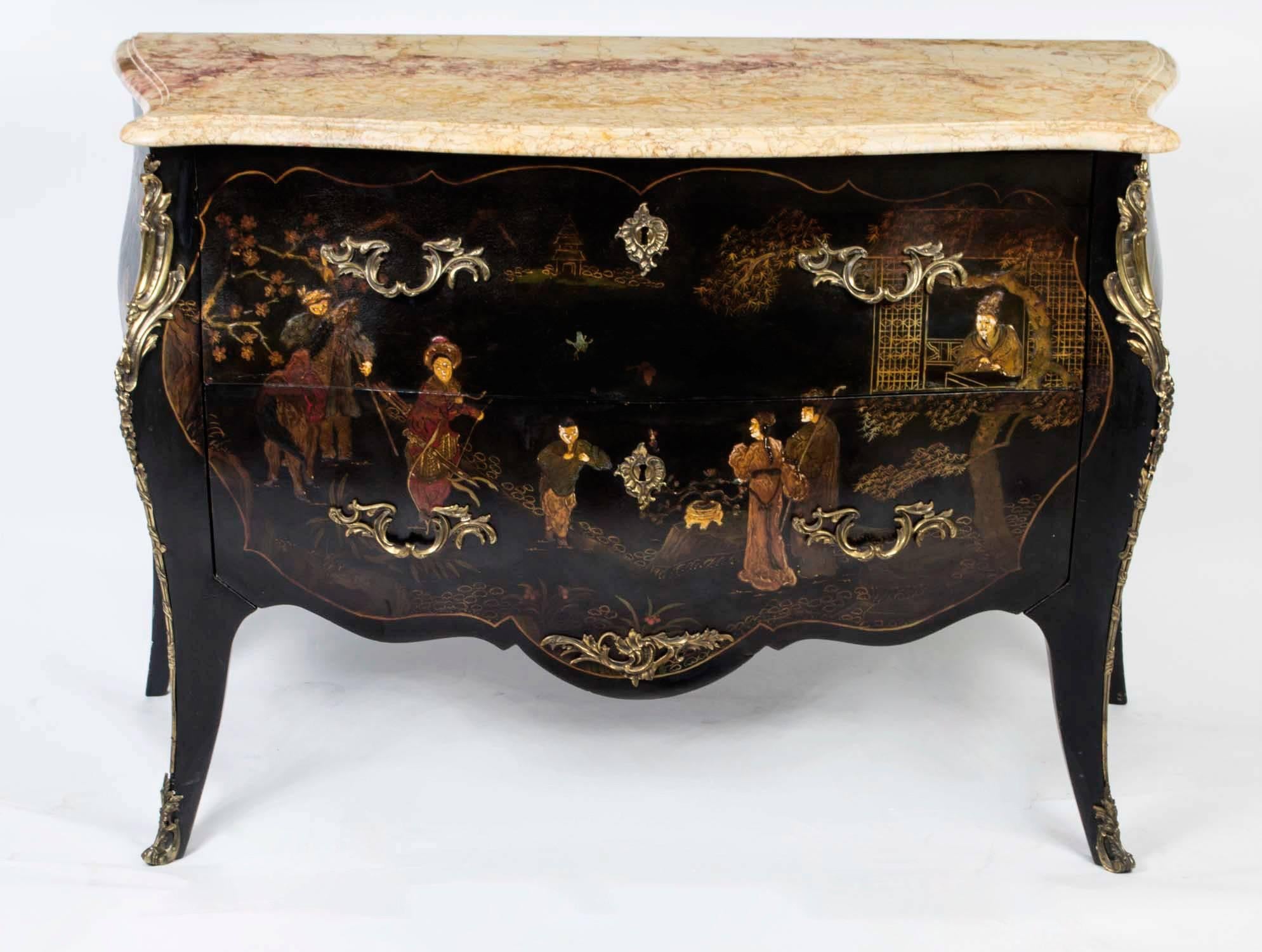 This is a stunning antique French bombe' Chinoiserie black lacquered commode, in Louis XV style, circa 1880 in date. 

It has the most wonderful ormolu mounts a breathtaking 'Marmo di Siena' marble top and fabulous Chinoiserie decoration. 

It