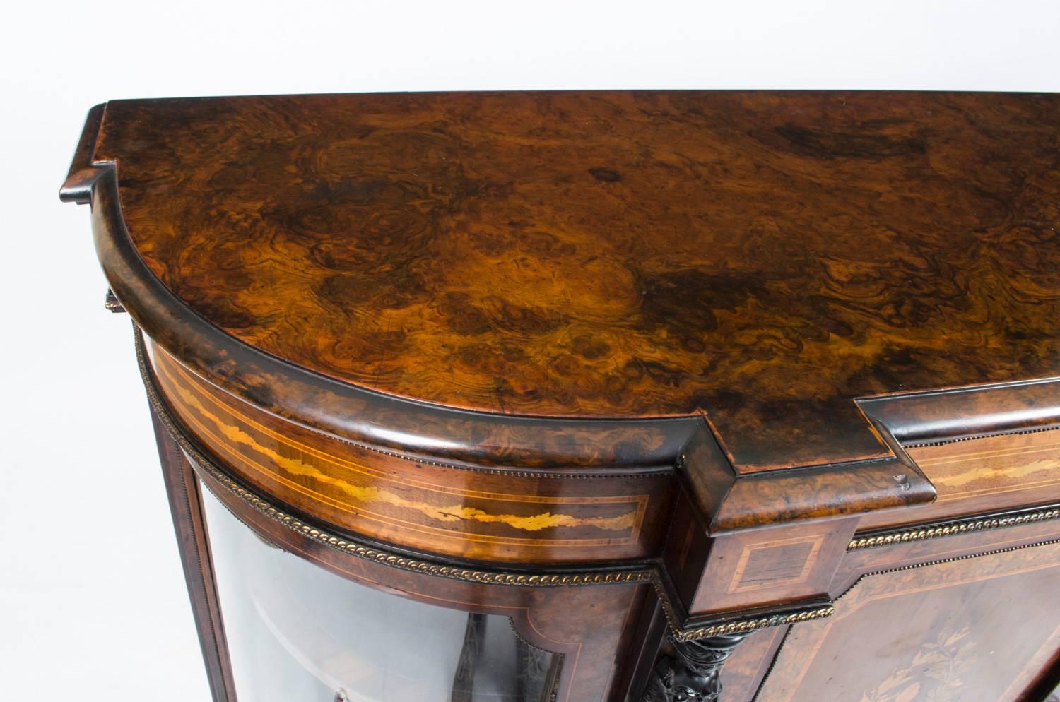 
Description this is a superb antique Victorian burr walnut and marquetry inlaid credenza, circa 1860 in date. Oozing sophistication and charm, this credenza is the absolute epitome of Victorian High Society. 

The entire piece highlights the