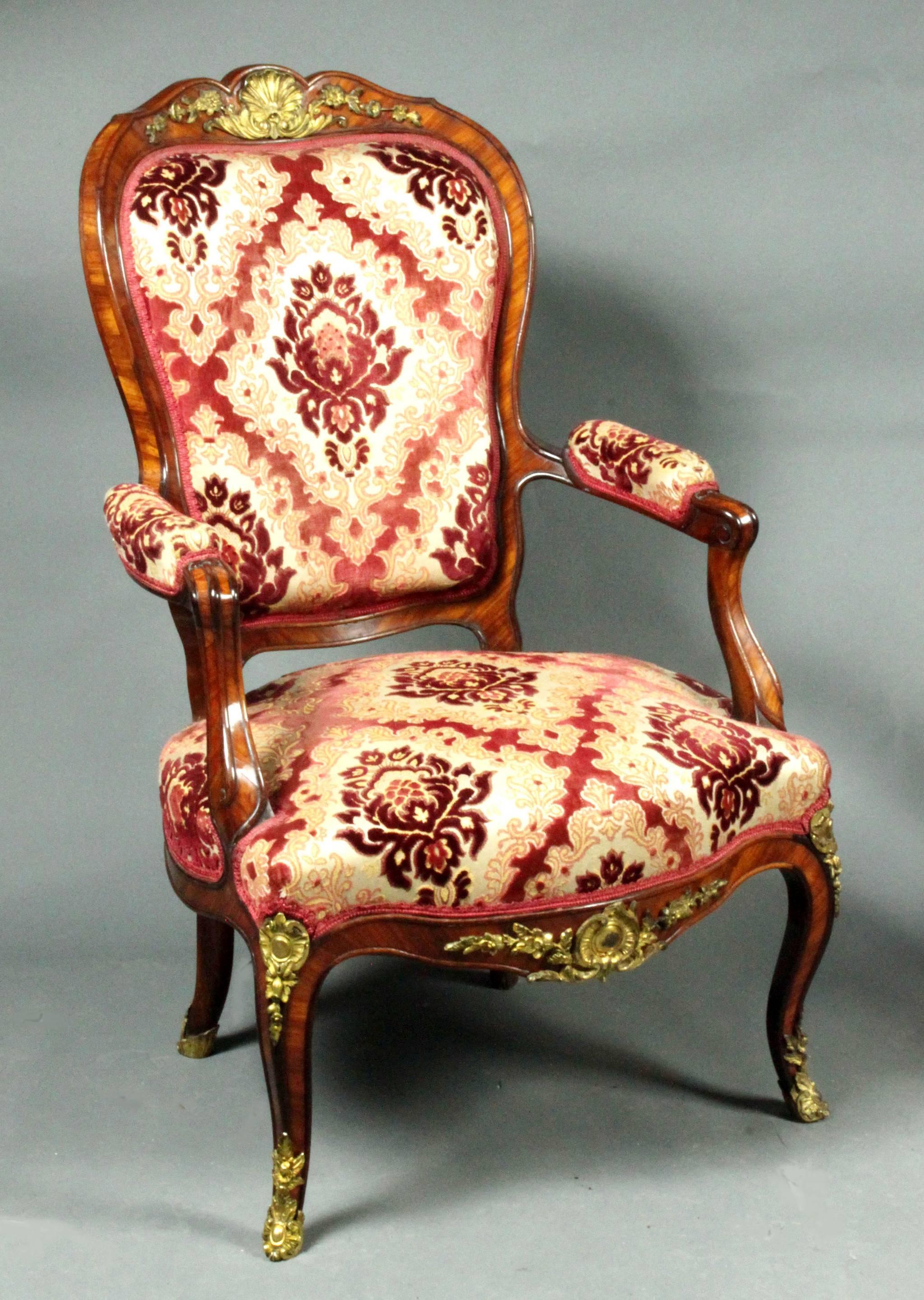 A fine pair of Louis XV style chairs. Herringbone bone crossbanding in kingwood and the original ormolu mounts.