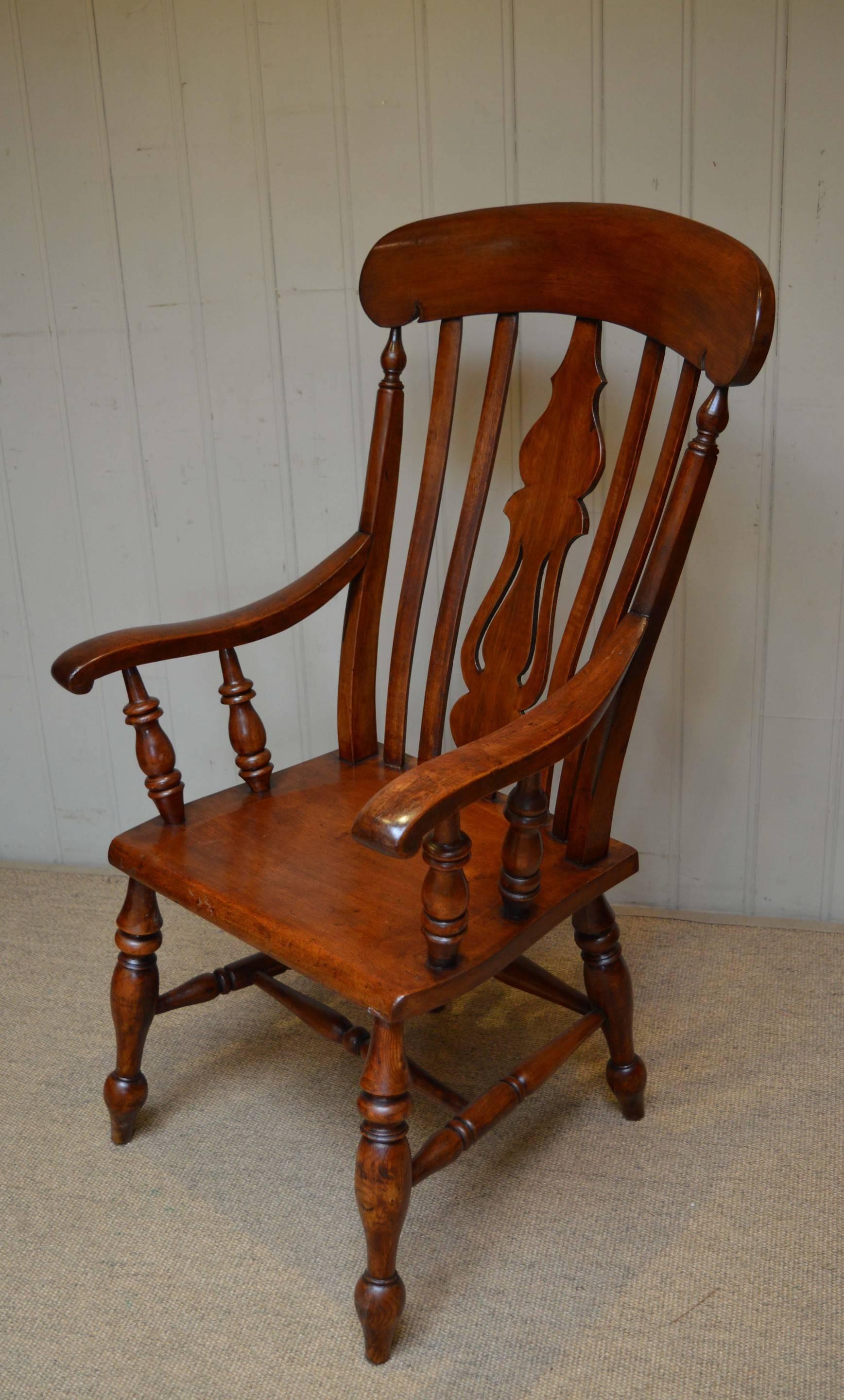 Fruitwood farmhouse carver chair probably originated from South Wales.