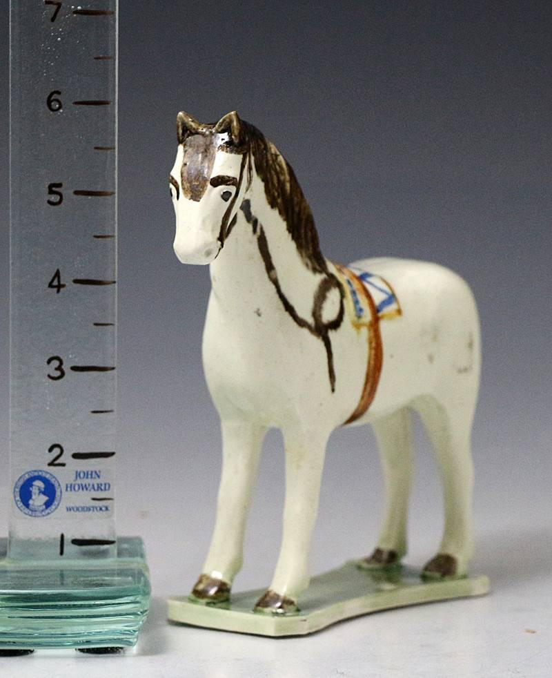 Antique English Pottery Figure of a Horse in Prattware, circa 1800 In Good Condition In Woodstock, OXFORDSHIRE