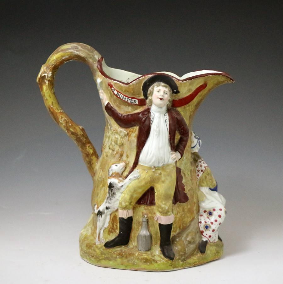 A relief moulded pitcher titled 