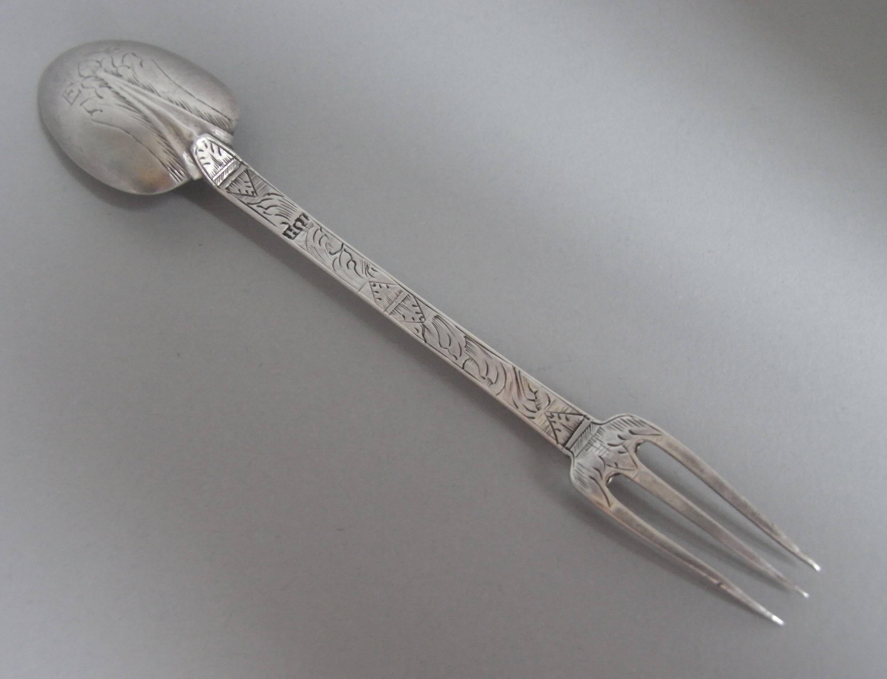 This extremely rare piece is beautifully decorated on the front and reverse of the stem with scratch engraved foliate designs and triangular motifs. The rat tail spoon end is engraved on the reverse with a foliate design and the contemporary