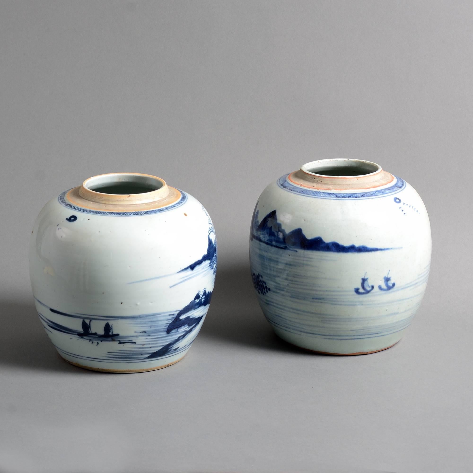 A pair of late 18th century blue and white glazed porcelain vase, each decorated with imaginary landscapes, seascapes and mountains with stylised figures in boats. 

Qing dynasty, Qianlong period.
