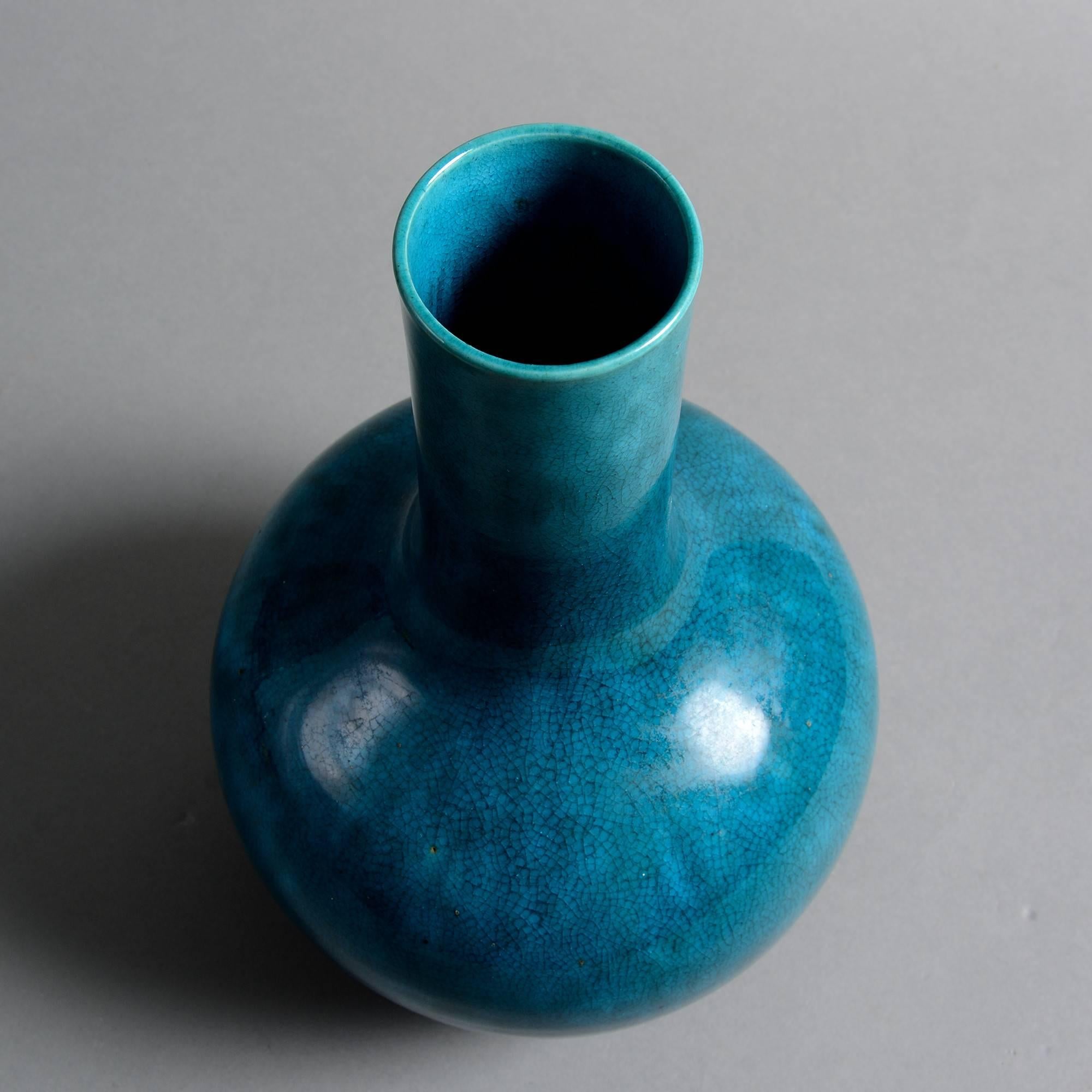 A mid-19th century porcelain bottle vase with turquoise glaze.

Qing Dynasty. Daoguang period.