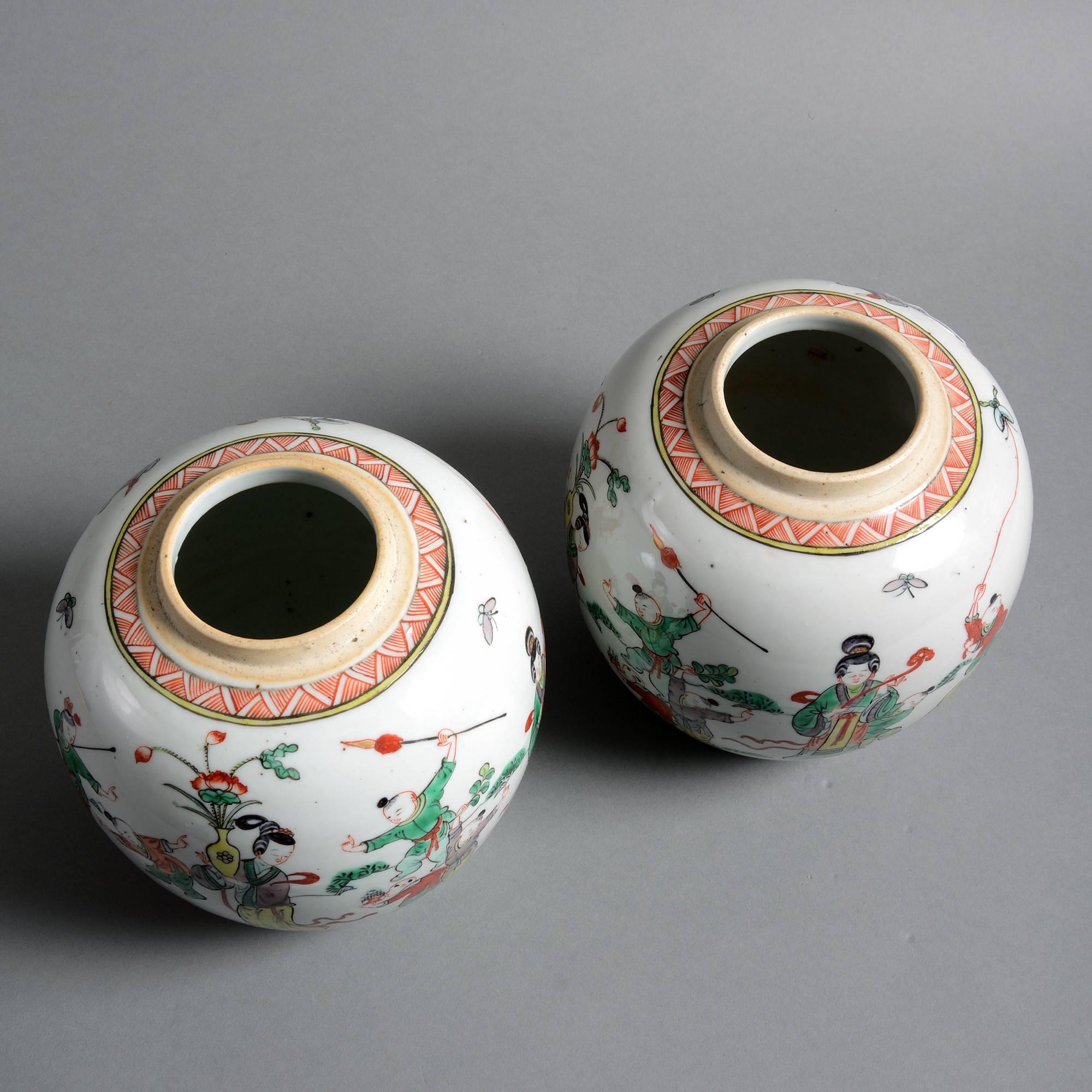 A 19th century pair of famille verte jars, the bodies with figurative decoration. 

Qing dynasty, Tongzhi period.