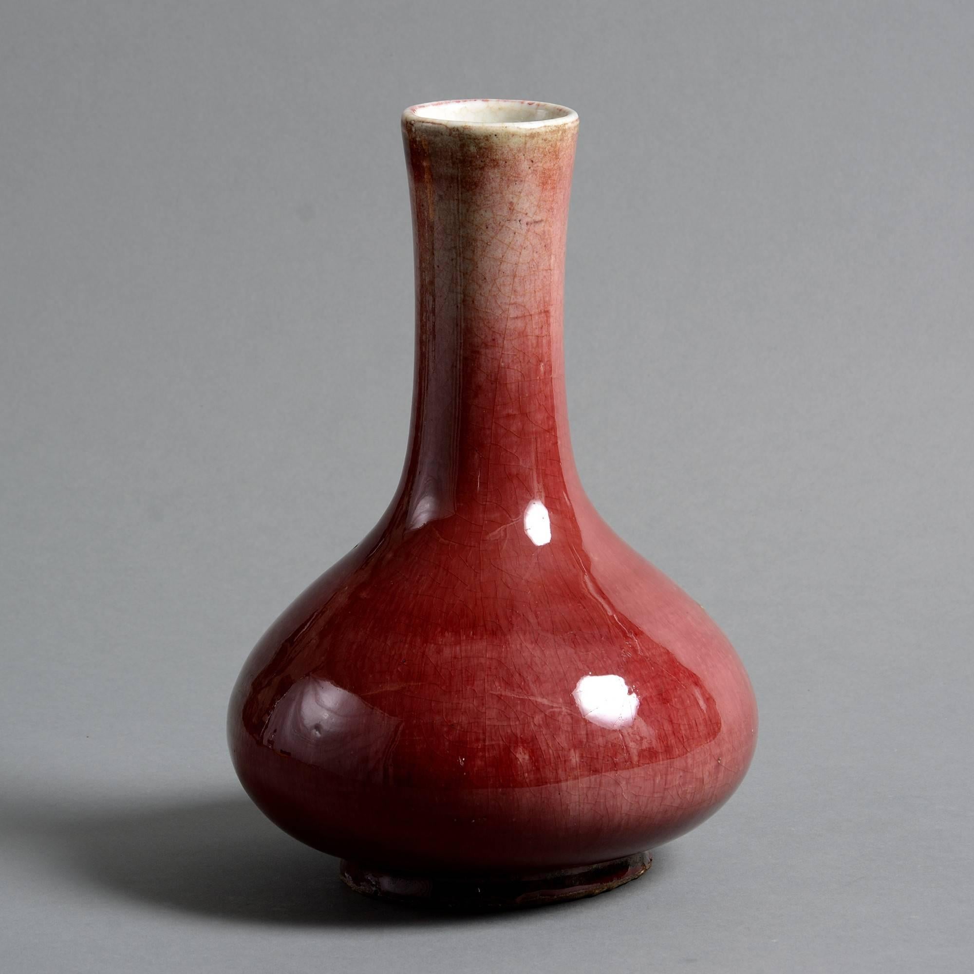 An early 19th century sang de boeuf porcelain bottle vase. 

Qing dynasty, Jiaqing period.