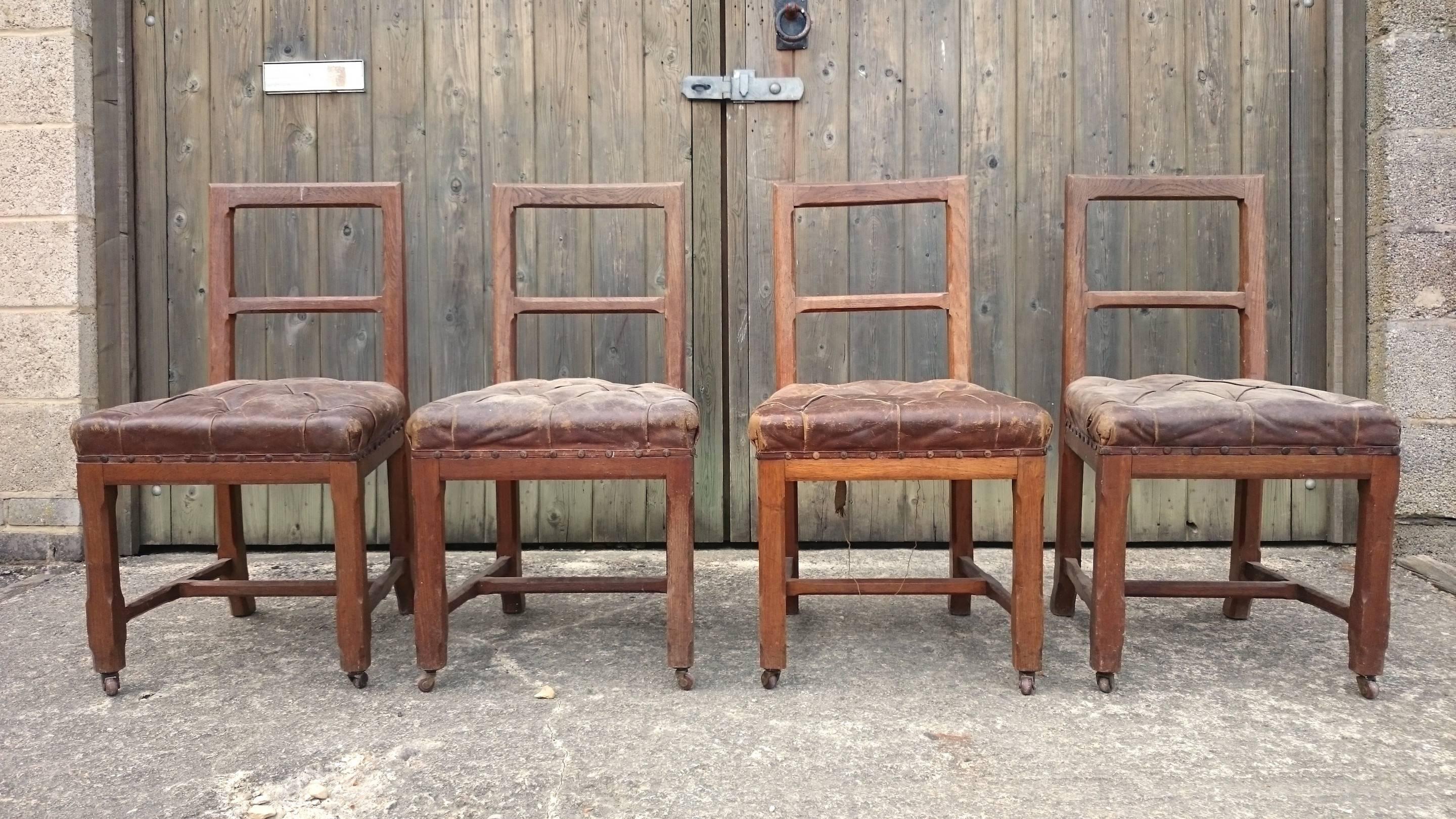 Set of four antique chairs with original leather seats. These four chairs are a good size and deep seated. They are very well made, with H frame stretchers for strength. Interestingly they are constructed with corner stretches at the joints rather