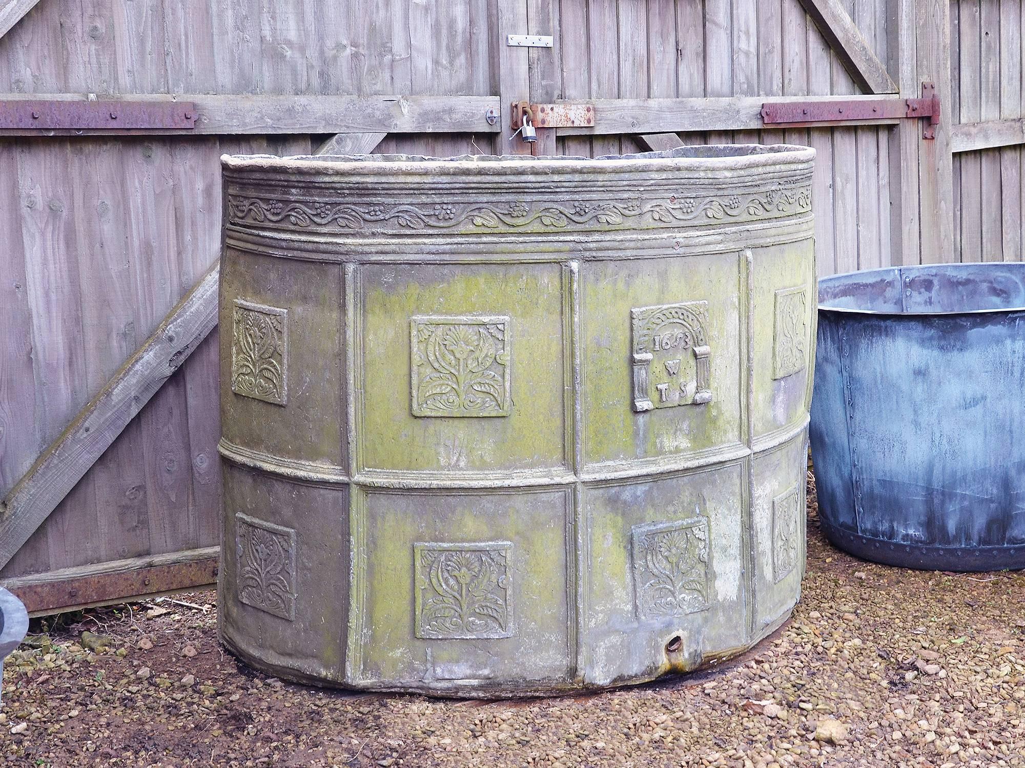 A rare addition to the very few known 17th century lead cisterns has a provenance to the Wren Family of Northam near Bideford in Devon. 

The front curvature consisting of ten square panels delineated by a raised bull nose moulding, inset with
