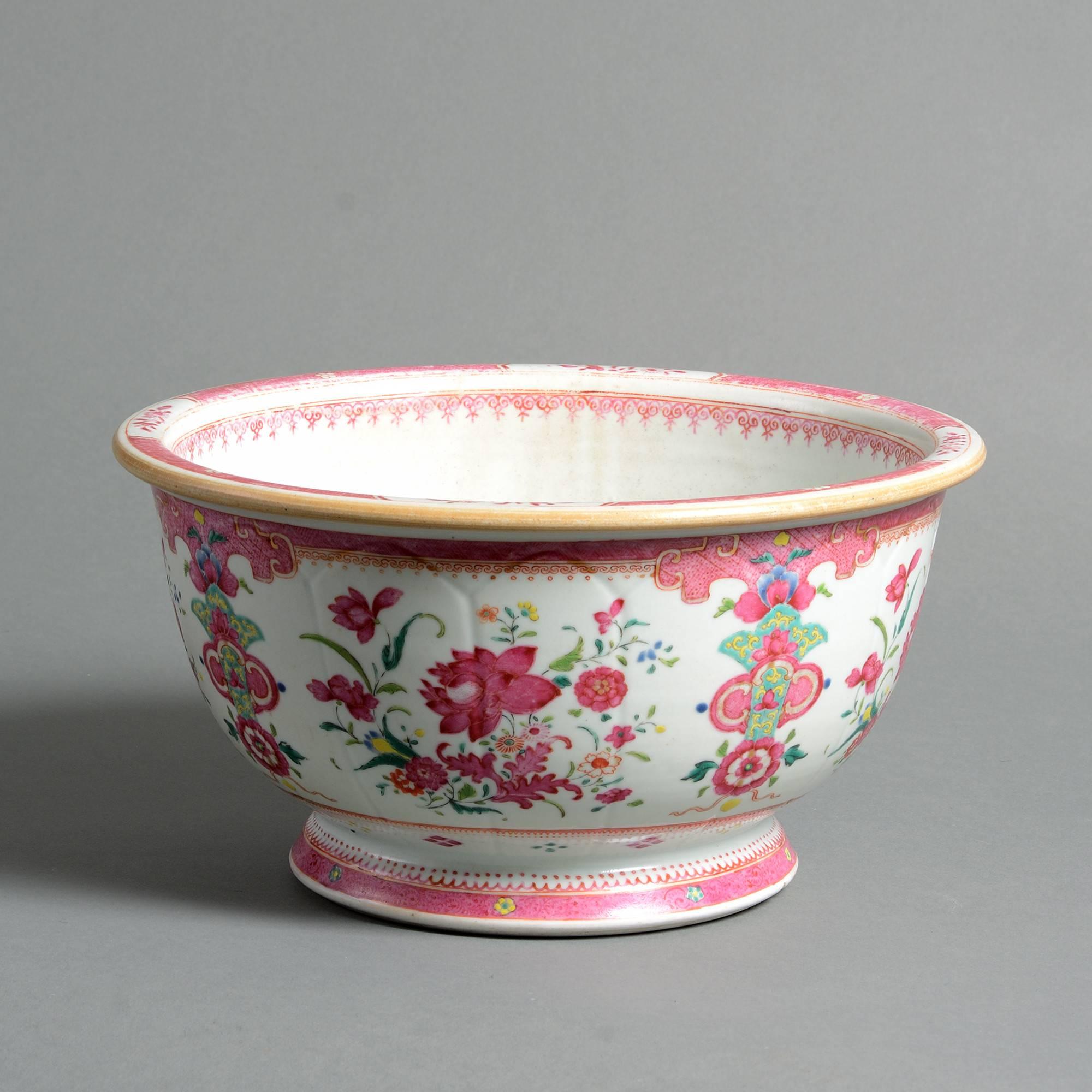 An early 19th century famille rose porcelain bowl with floral decoration throughout.

Qing dynasty, Jiaqing period (1796-1820).