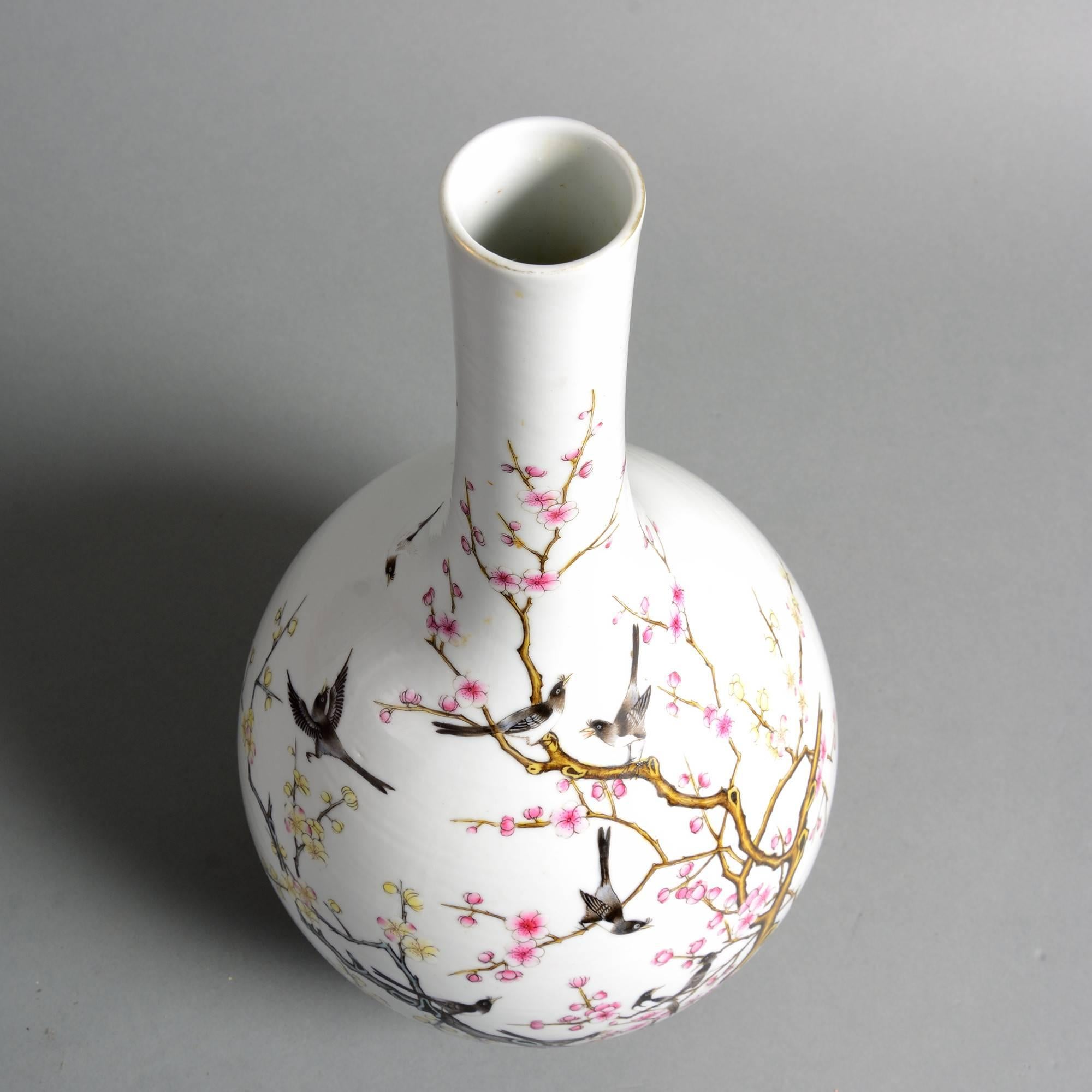 Chinese 19th Century Qing Famille Rose Bottle Vase with flowering prunus tree and birds