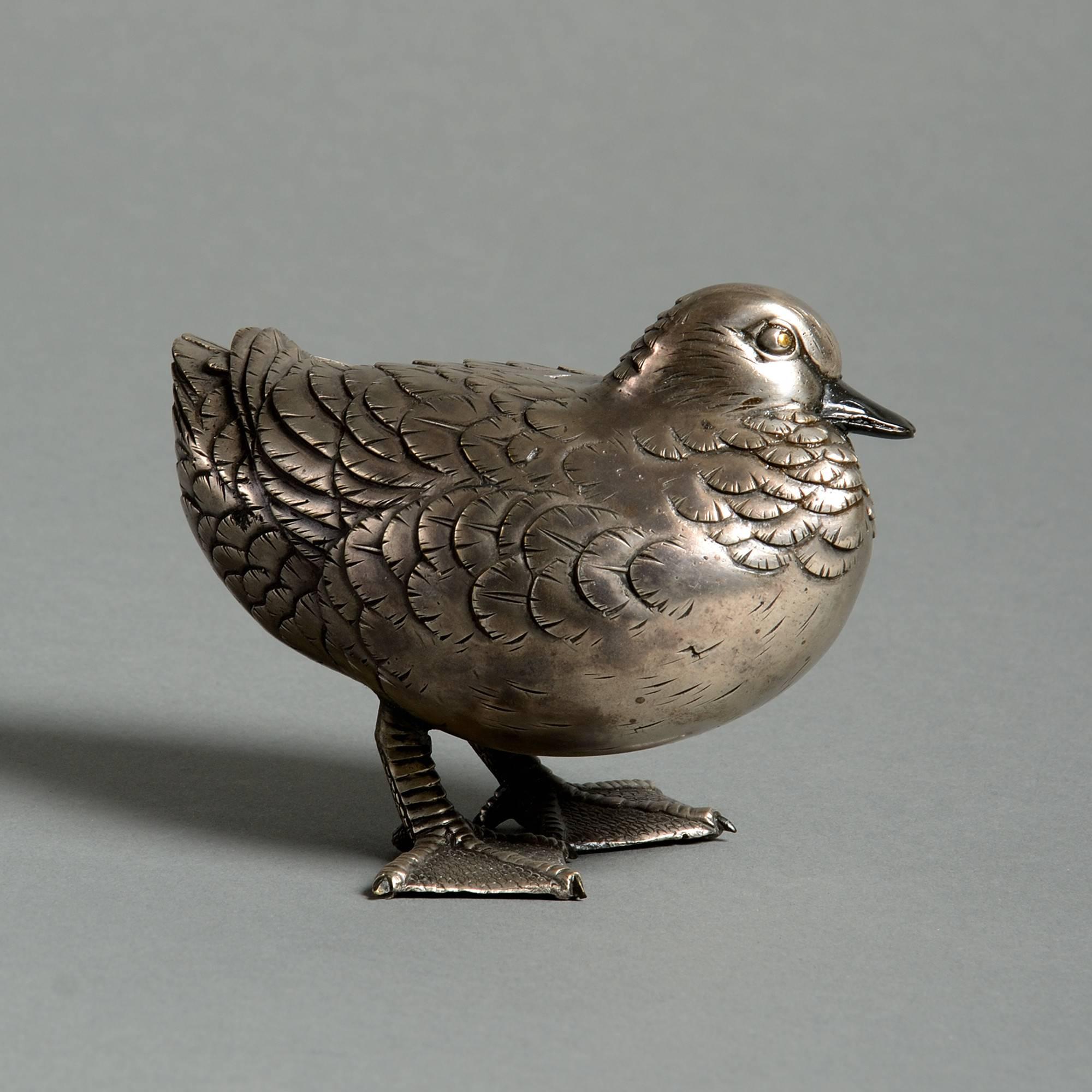 A finely cast and chased silver gilt bronze duck with inlaid eyes,

Meiji period (1868-1912).