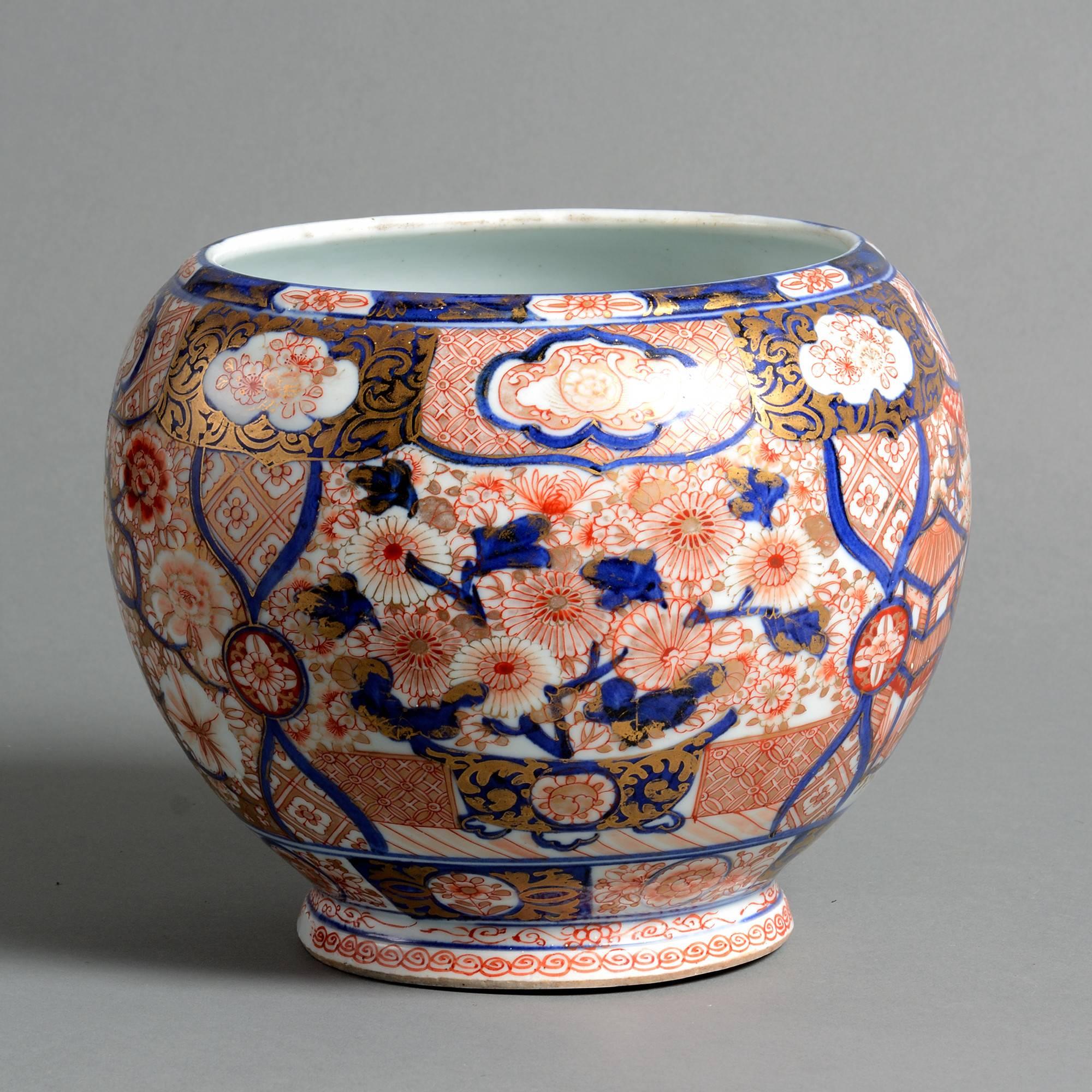 A late 19th century Imari porcelain jardiniere or planter, decorated in the traditional manner in red, blue and gilded glazes upon a white ground.

Meiji period (1868-1912).