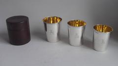 An extremely rare and outstanding set of three George III Graduated Beakers