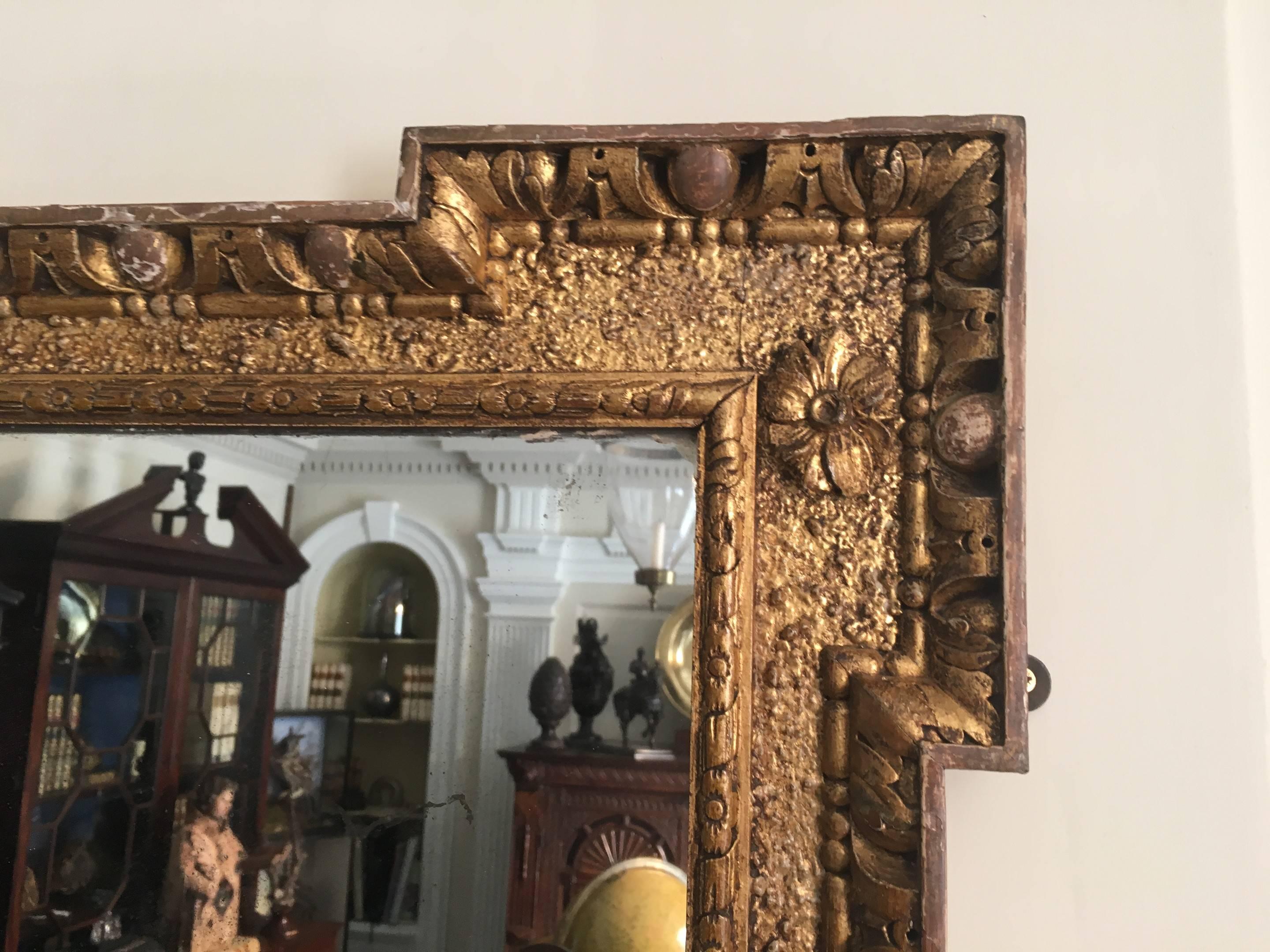 A good George II period over mantel mirror with carved egg and dart boarder.