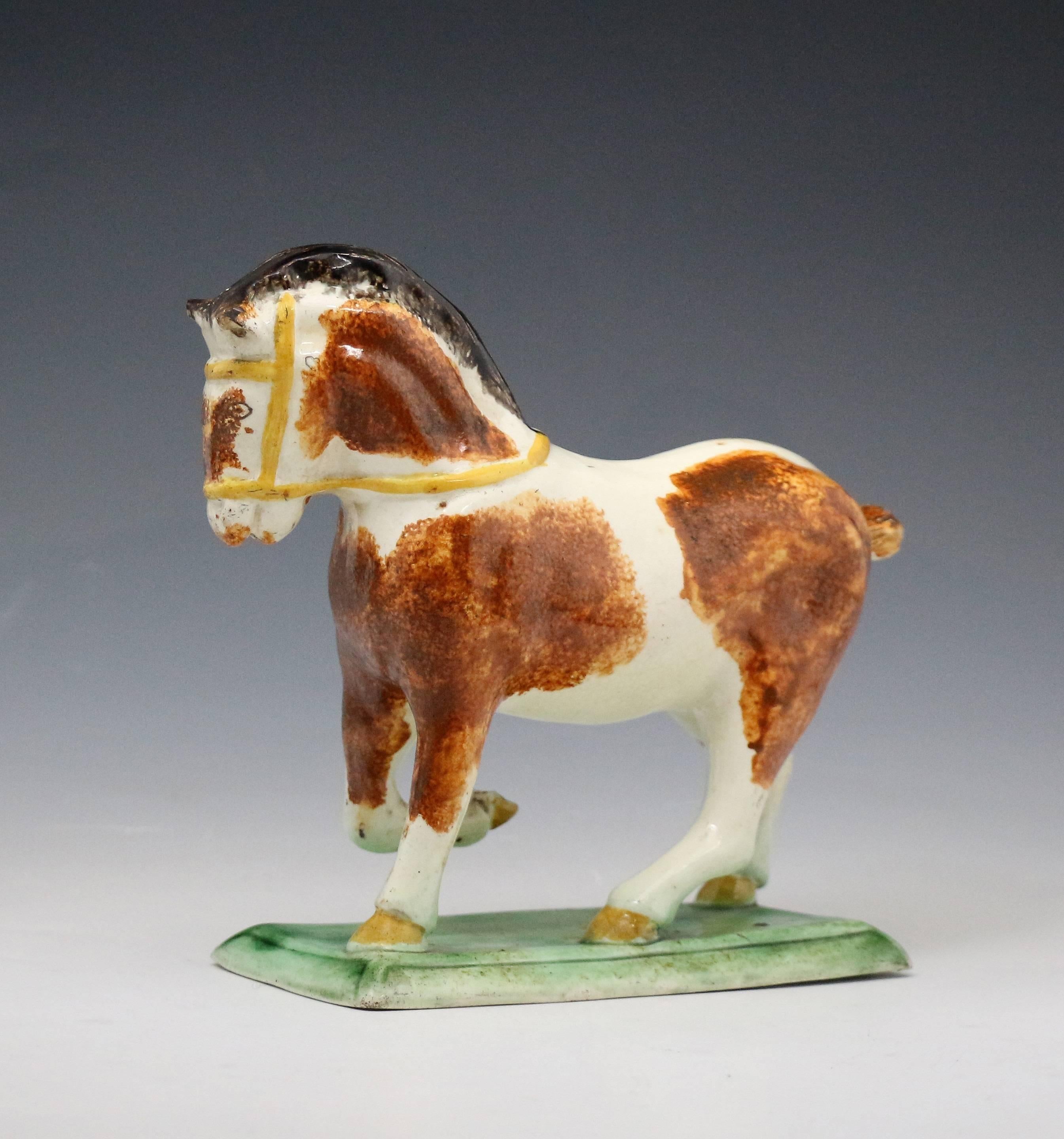 Staffordshire Pottery Figure of a Suffolk Punch Horse, England, circa 1790 In Good Condition In Woodstock, OXFORDSHIRE