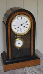 French Oak and Ebonized Mantel Clock