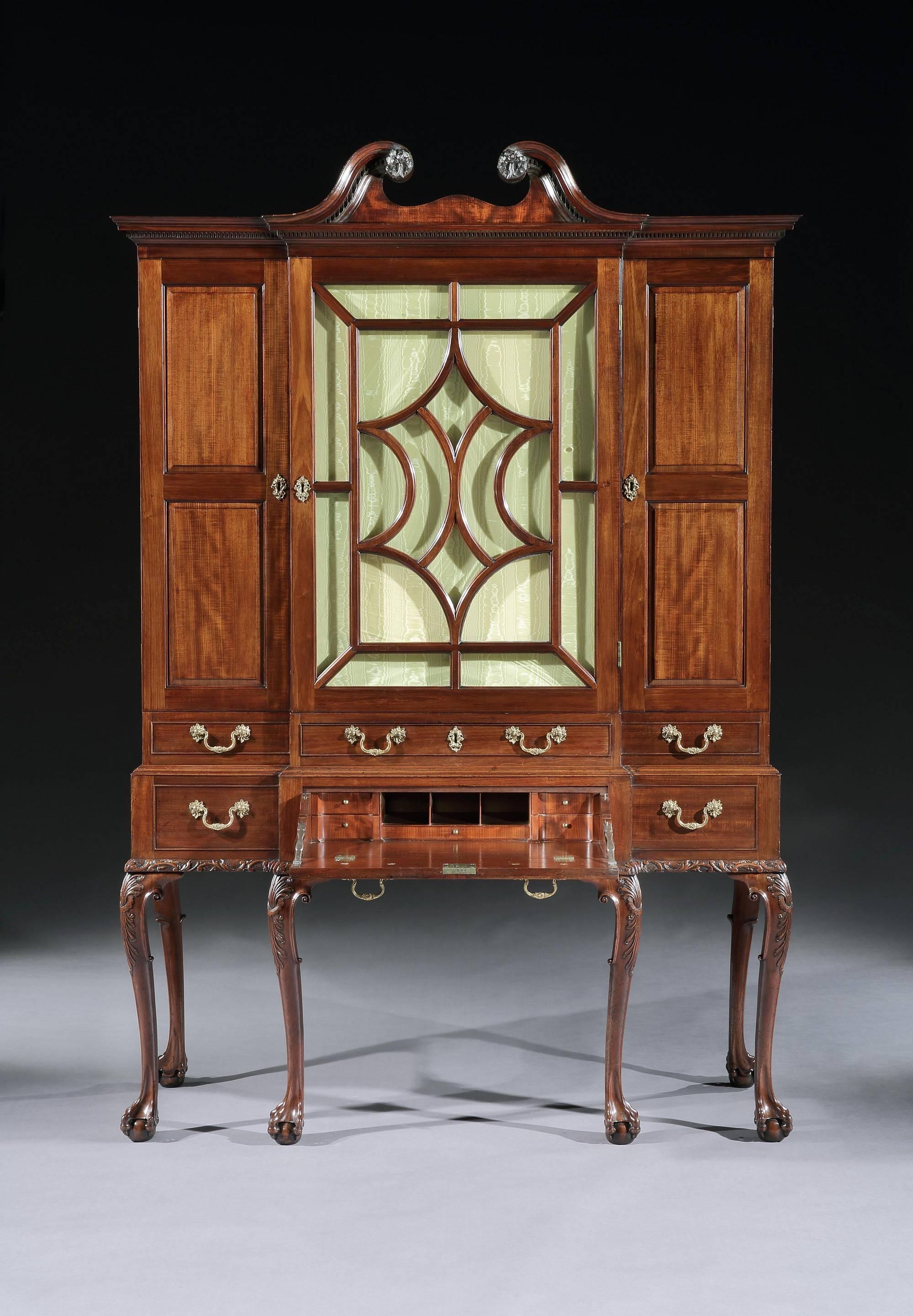 This unusual cabinet belongs to a small group of three sharing a similar design: one of the others, made in walnut, was formerly in the Percival D. Griffiths Collection, and the third, made in mahogany, was formerly in the Moller Collection. 

The
