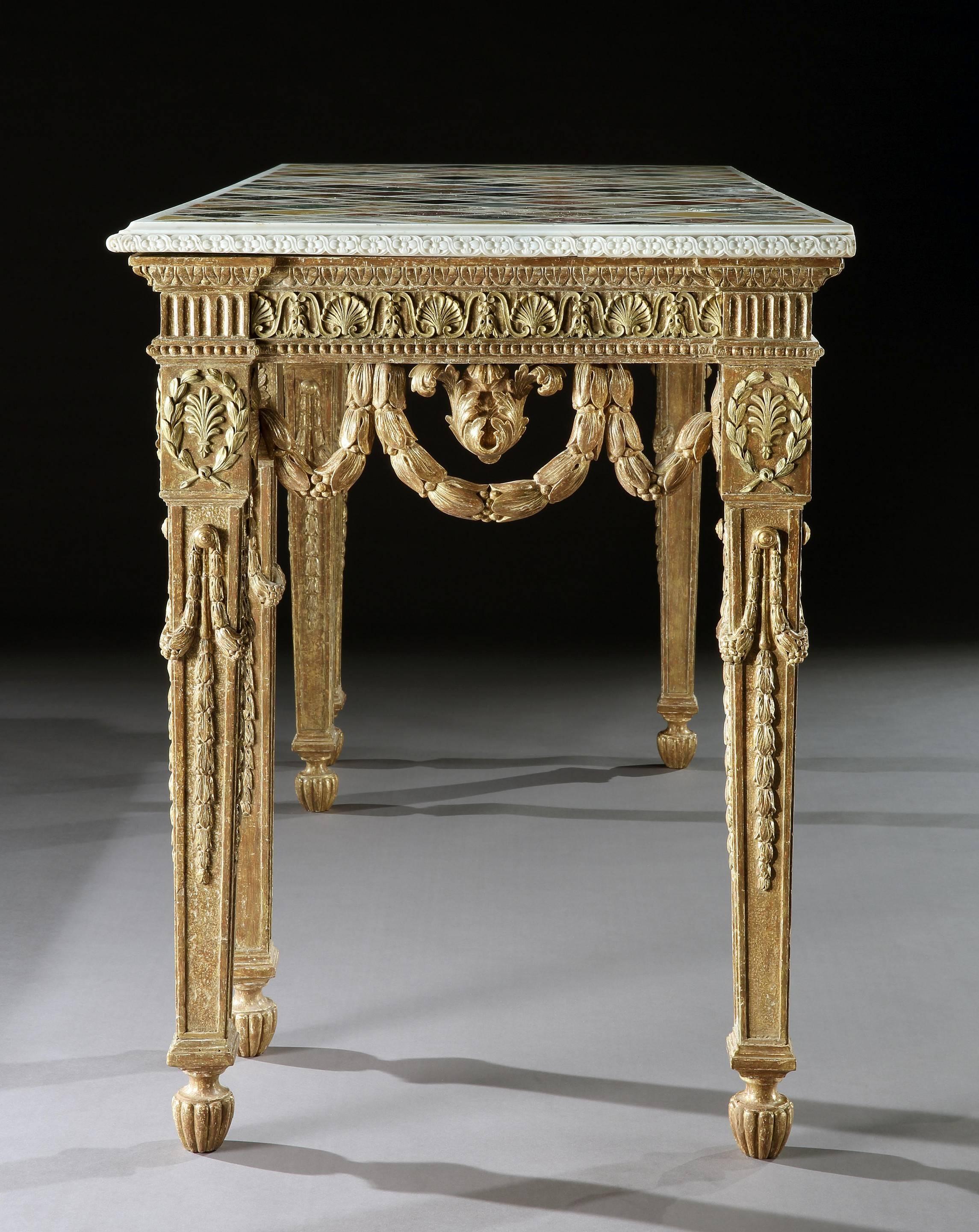 A George III giltwood side table by John Linnell with a Roman specimen marble top. 

The giltwood base closely follows two design drawings by John Linnell, dated 1765, which are preserved in the Victoria and Albert Museum, London. As the Linnell’s