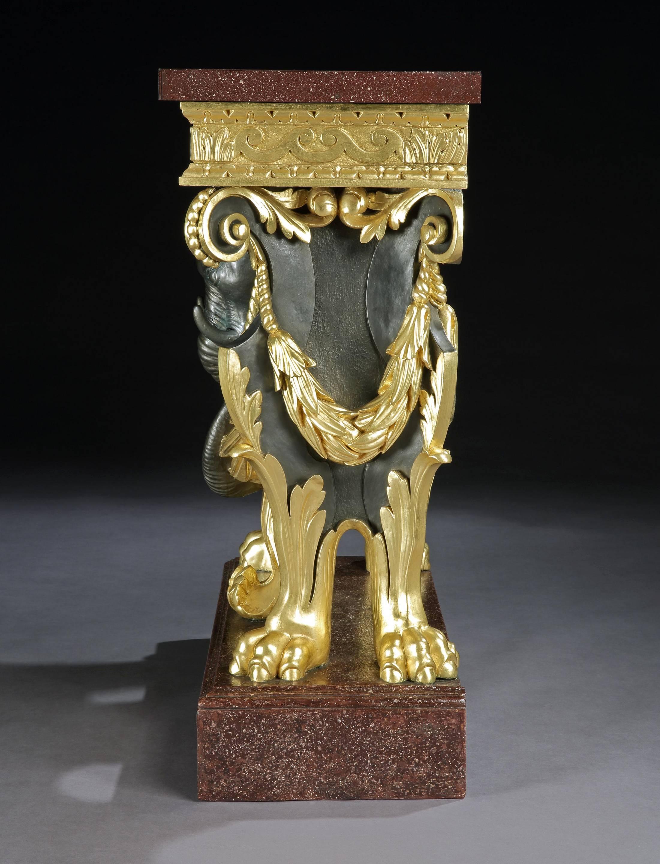 A George II parcel-gilt side table with Egyptian porphyry top. 

A pair of stools closely related to the table and also featuring elephant heads are now in a private collection in the USA. Although this is not confirmed, they may well belong