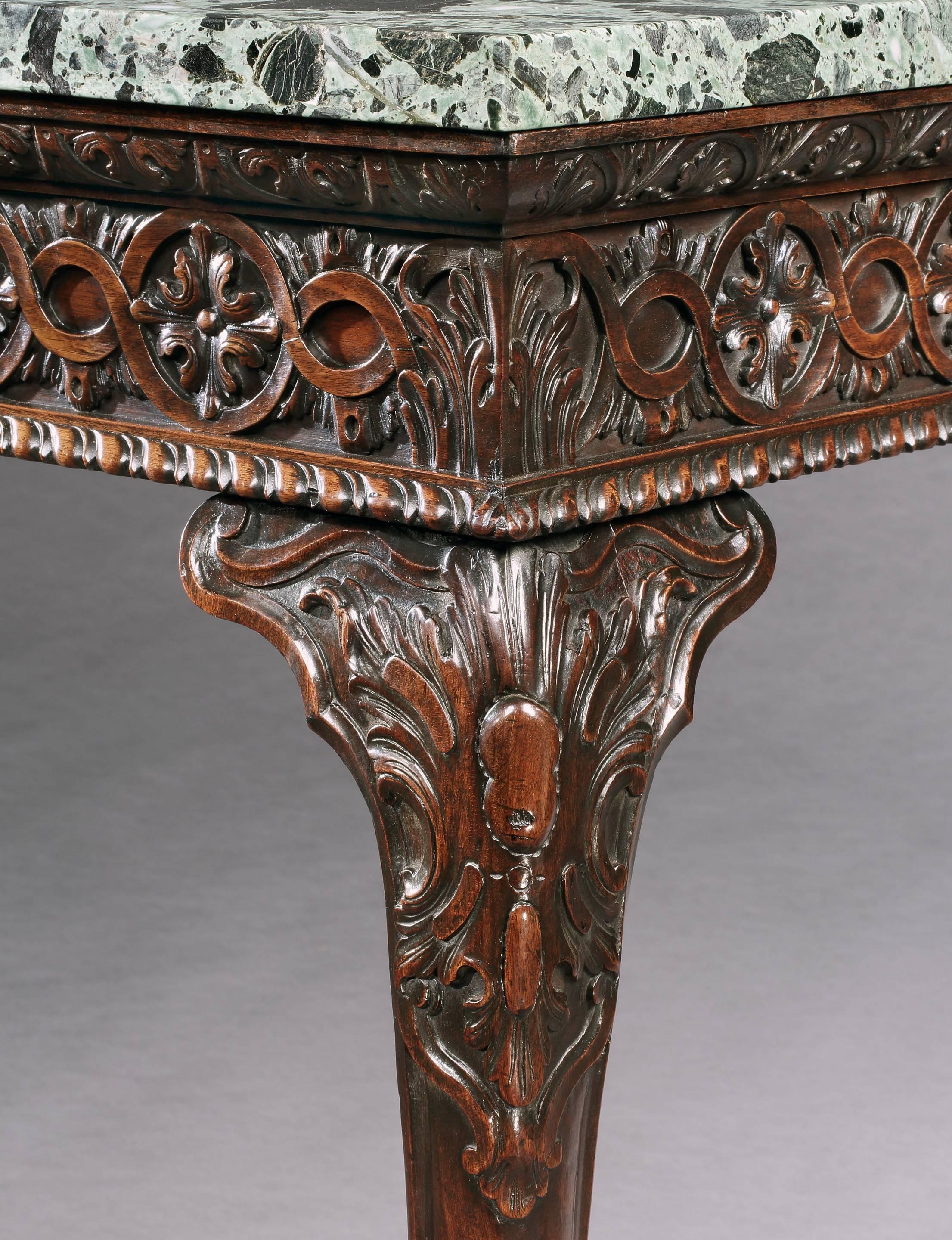 A George II mahogany side table. 

The table has acquired an outstanding patina and retains the original ‘Light Greek Antique Green’ marble top. 

Price: £100,000 +.