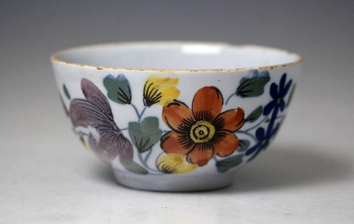 A fine and rare delftware pottery teabowl and saucer with polychrome floral decoration in the Fazackerley palette and style and tinged blue glaze. These small gems of pieces which have endured over 250 years are rare survivors.
Liverpool