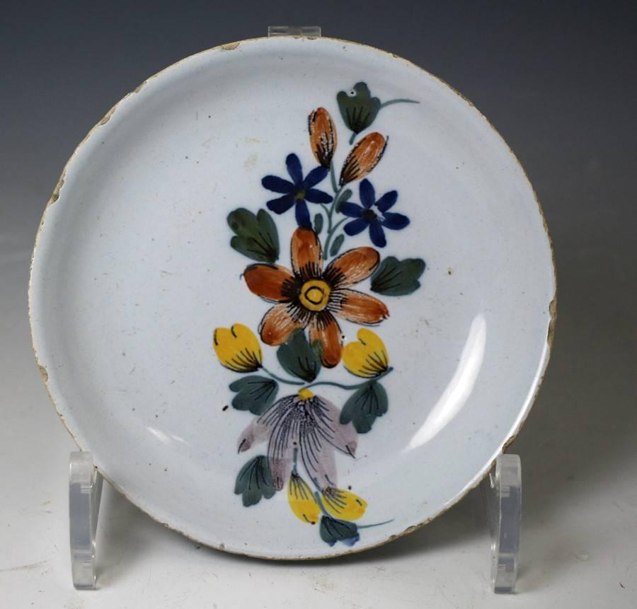 English Delftware Pottery Polychrome Decorated Tea Bowl and Saucer, Liverpool Delftworks