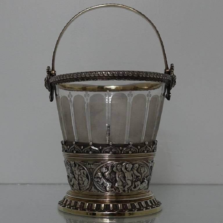 A quite stunning and incredibly rare partial gilt electro formed 19th century Victorian ice bucket with a decorative frosted glass liner.