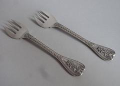 A very rare pair of cast Armorial "Palm" pattern Cake Forks made by George Adams