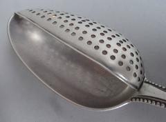 A very fine George III Straining Spoon made in London in 1776 by Walter Tweedie
