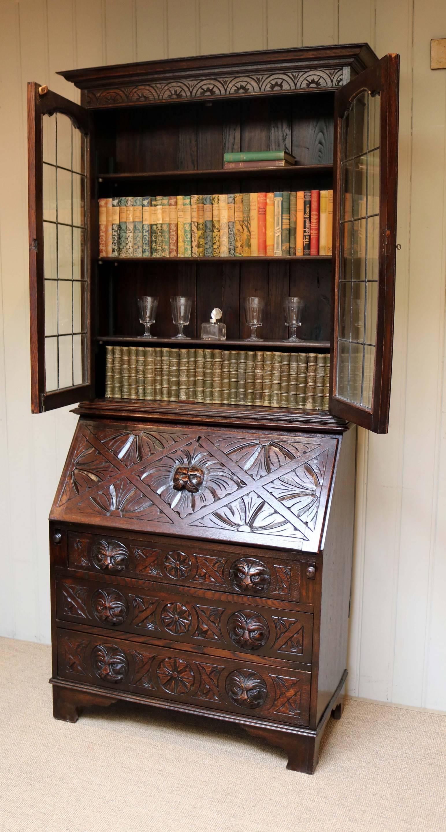 19th Century Carved Oak Green Man Bureau Bookcase For Sale