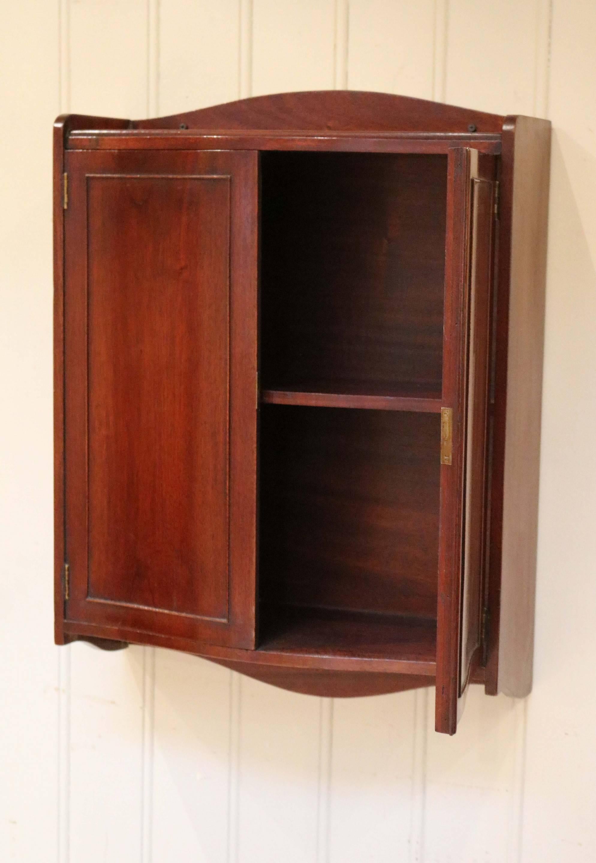 English Mahogany Serpentine Front Wall Cabinet For Sale