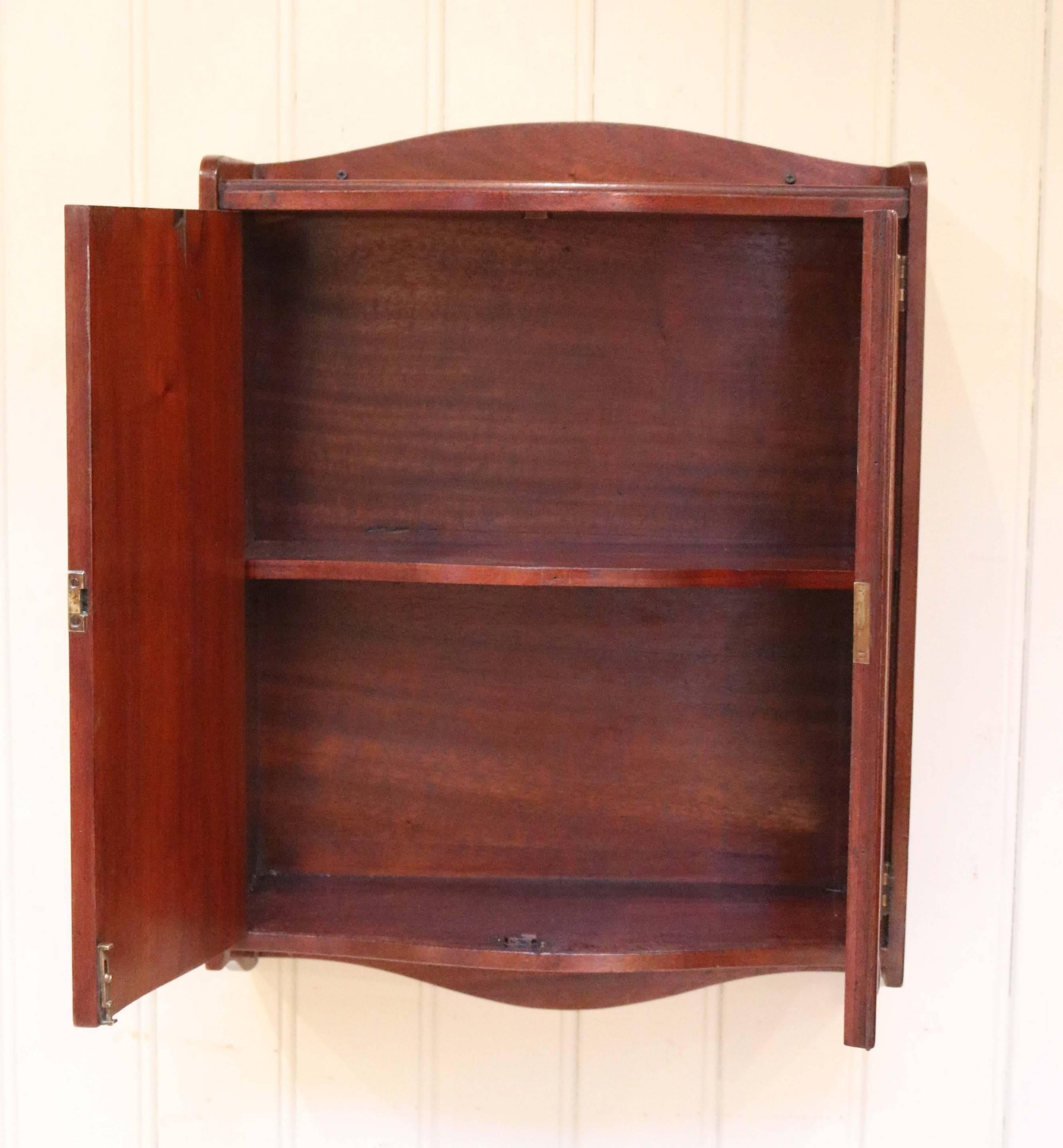 20th Century Mahogany Serpentine Front Wall Cabinet For Sale