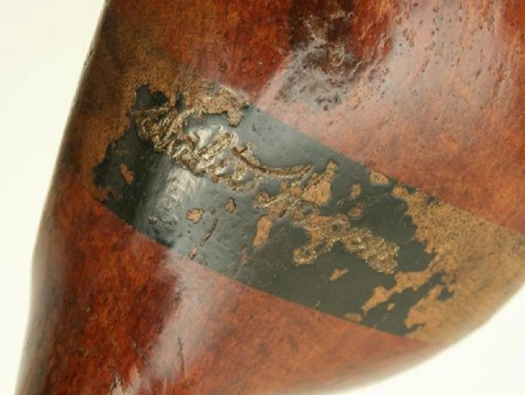 A beautiful persimmon wood golf club, driver by Cochrane's Ltd, Edinburgh. The club with original hickory shaft, polished leather grip and a ½ brass sole plate. The head stamped Walter Hagen, the brass sole plate "genuine Walter Hagen Model,
