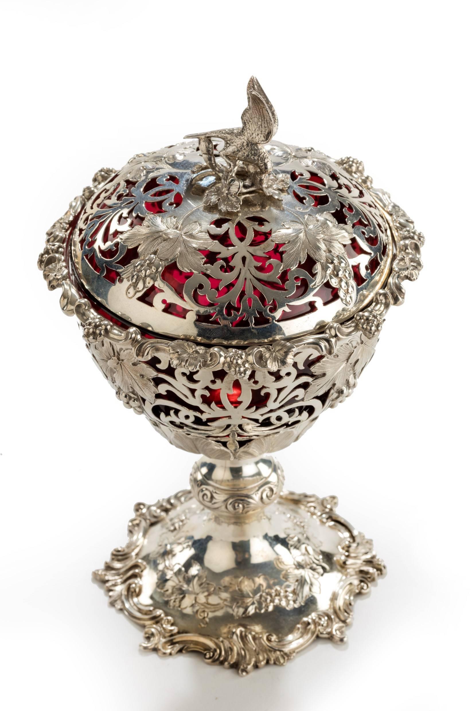 Edward and John Barnard Cranberry glass lines preserve pot and cover, London, 1855.