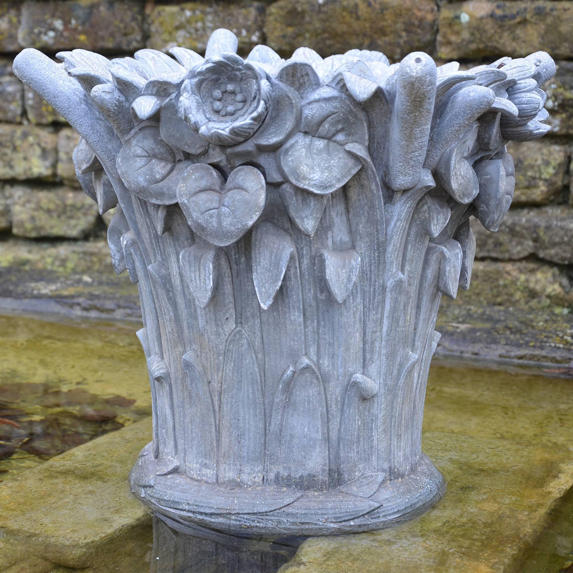 Of circular form embellished in the cast with reed bulrush and lily ornament. This fountain was probably a late cast from the famous Val D'Osne Foundry just north of Paris.