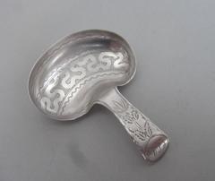 A very rare George III "Kidney" Caddy Spoon by Cocks & Bettridge.