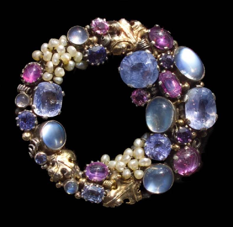 Open circular form, with wire- scrolls & leaves by DORRIE NOSSITER (1893-1977)