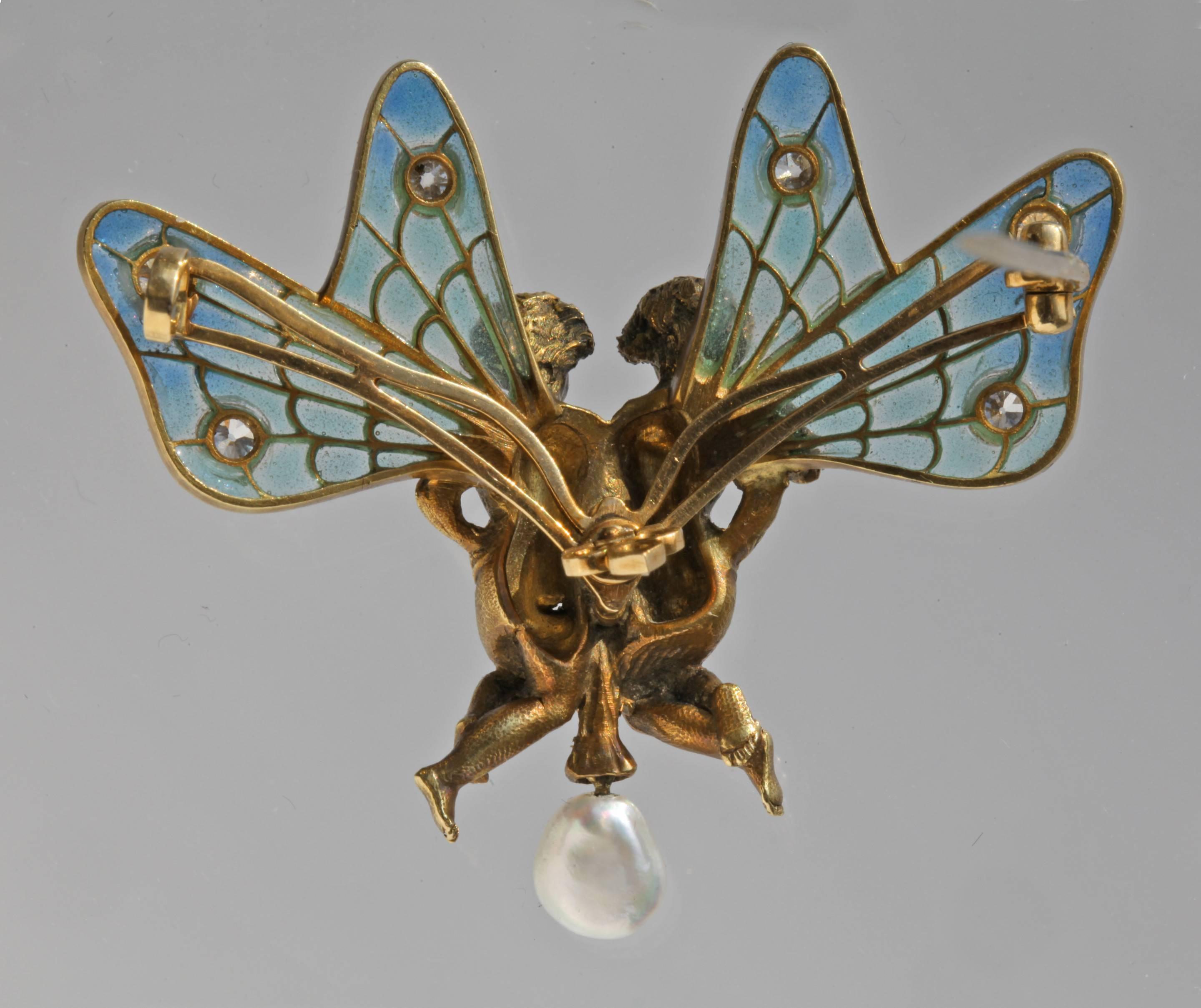 'The Bond of Love' The workmanship of this Twin Fairy brooch is of the highest quality in the manner of Lalique.
Marks: Plisson & Hartz maker's mark & eagle's head
Illustrated in our book: Beatriz Chadour-Sampson & Sonya Newell-Smith, Tadema Gallery