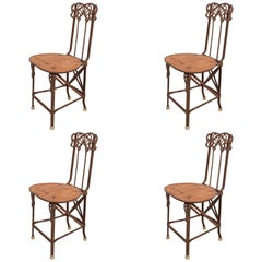 Set of Four Art Nouveau Cast Iron Folding Chairs with Wood Seats