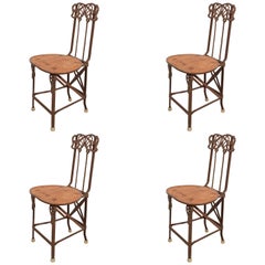 Set of Four Art Nouveau Cast Iron Folding Chairs with Wood Seats