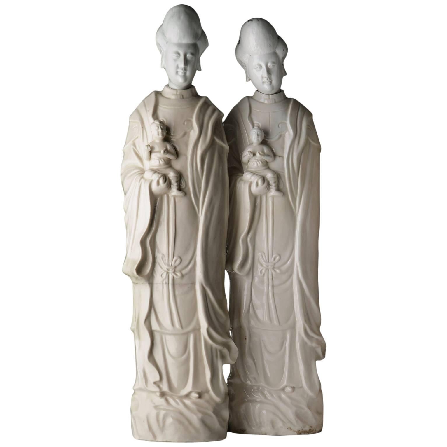 Pair of Chinese Blanc de Chine Porcelain Figures of Guanyin Songzi For Sale