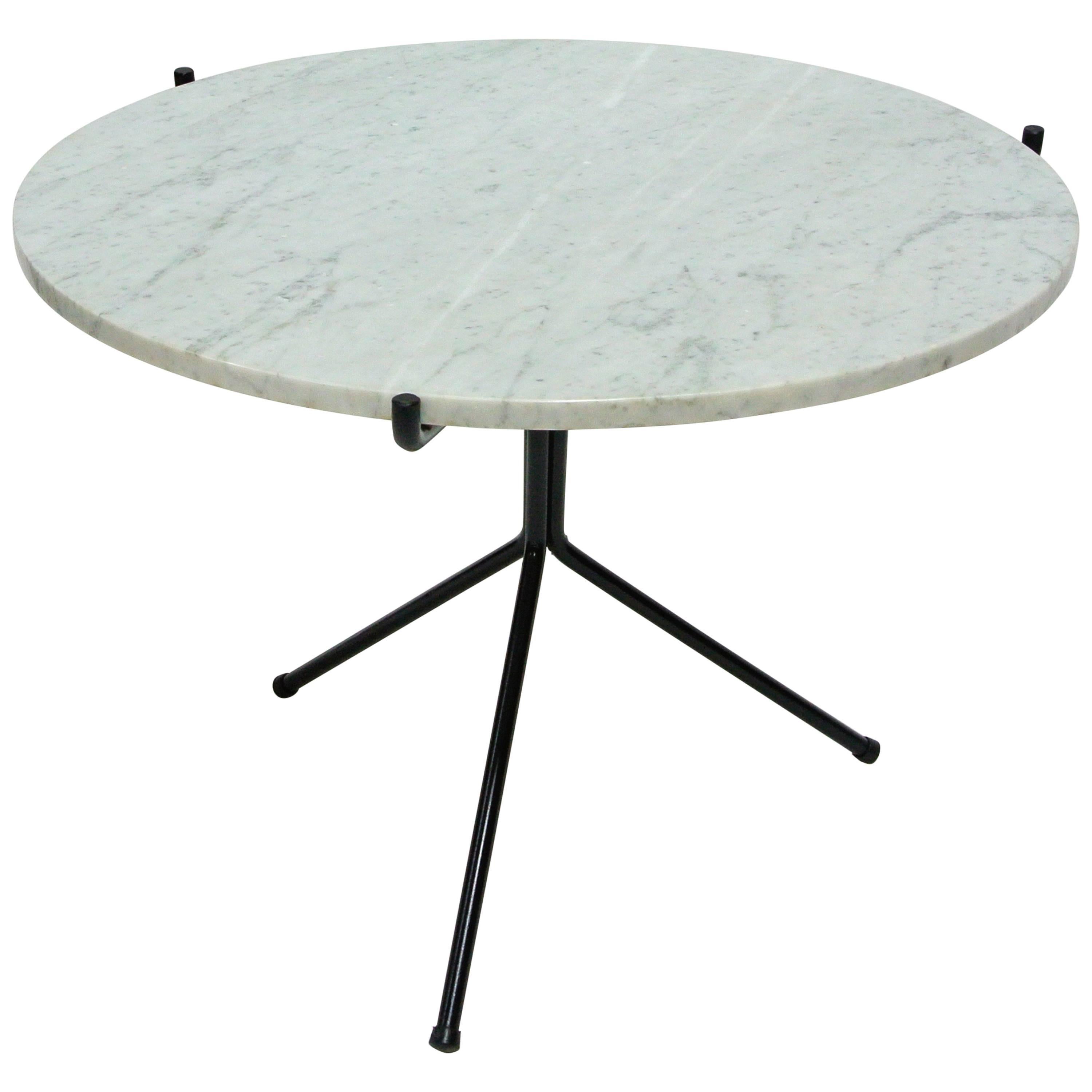 Rare and elegant marble and iron tripod table designed by Norman Cherner for Konwiser, circa 1950s.