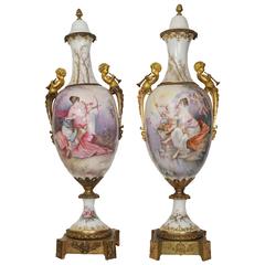 Large Pair of White Sevres Covered Porcelain and Bronze Figural Urns