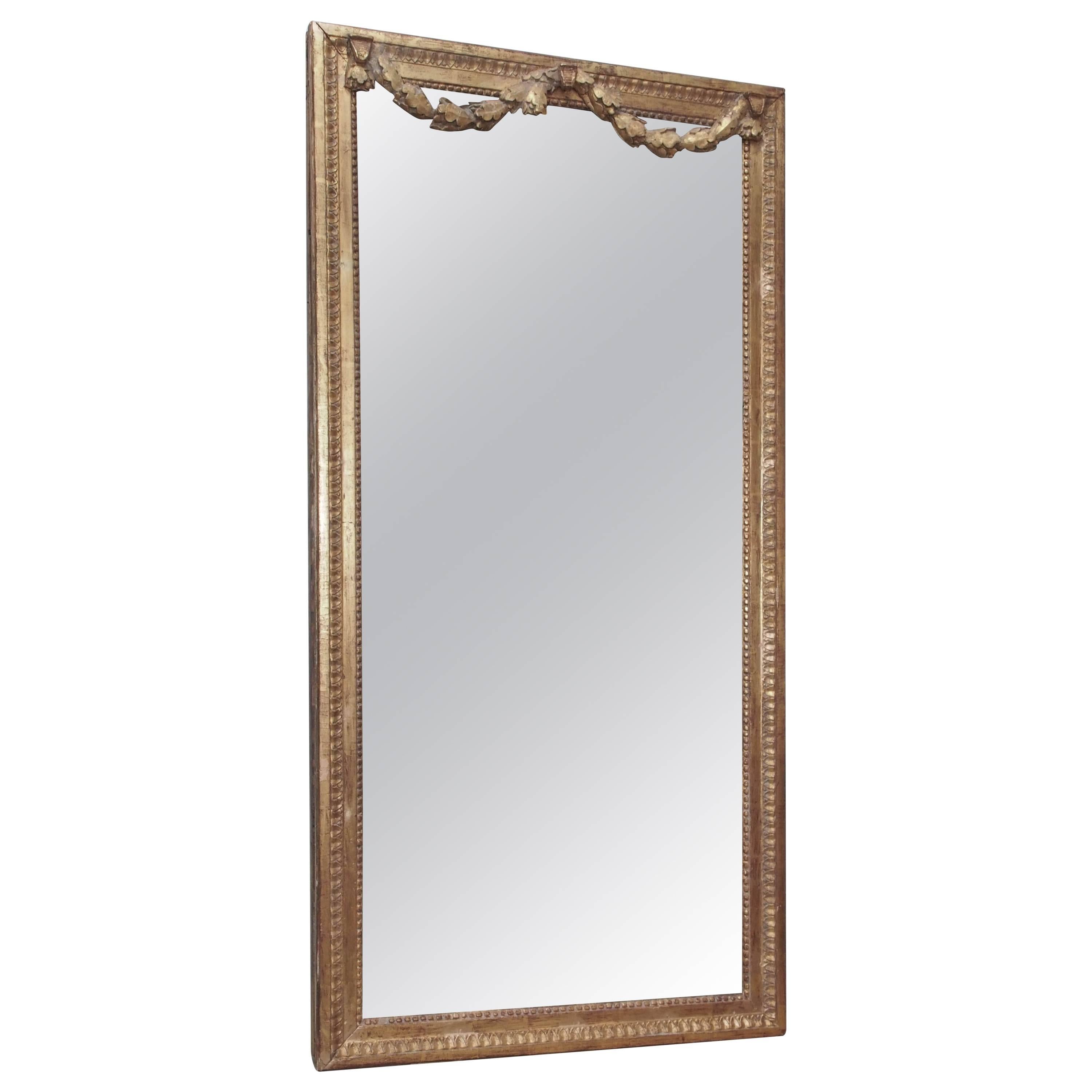 Giltwood Neoclassical Mirror with Garland Swags For Sale
