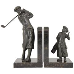 Vintage French Art Deco bookends golfer with caddy, 1930