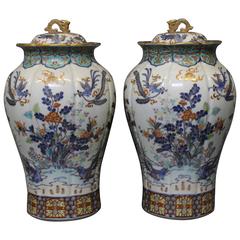 Pair of Antique Japanese Vases and Covers Decorated with a Floral Design